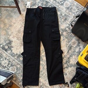 Match Black Cargo Pants with Utility Design